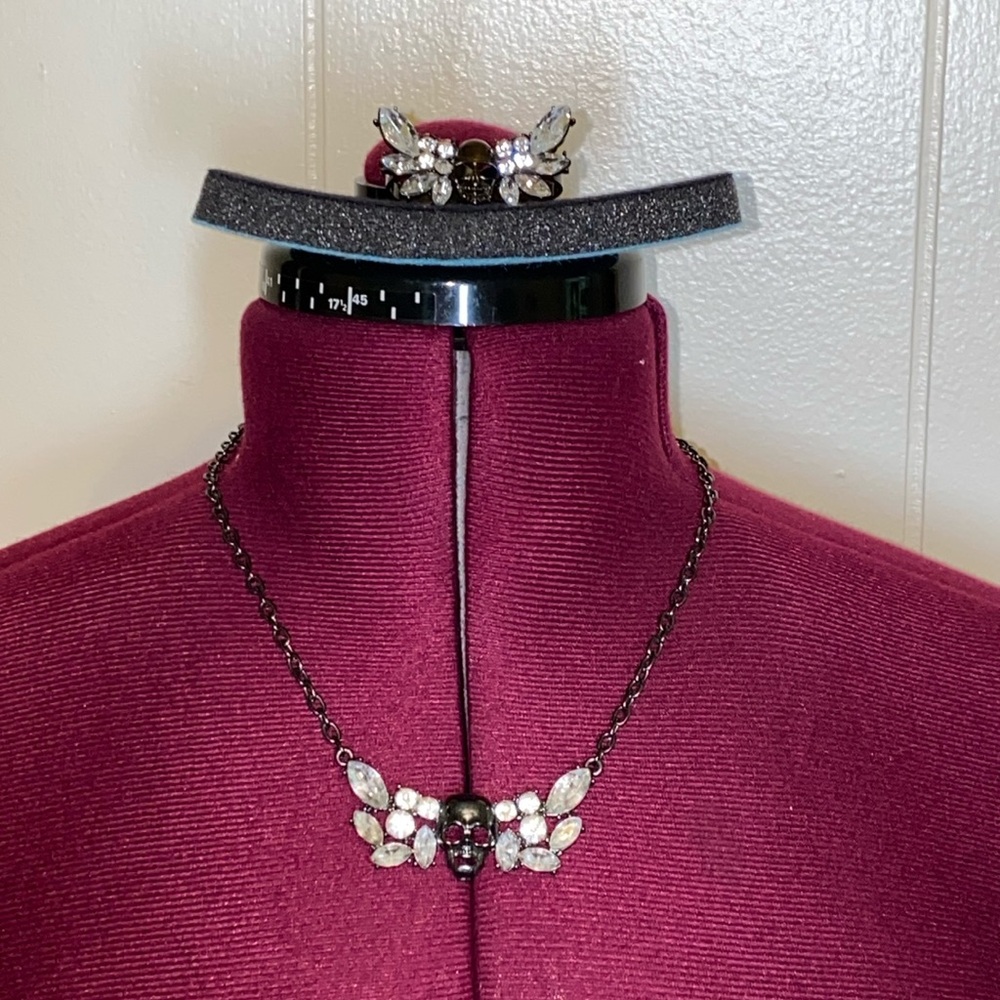 Torrid skull & “crystal” wing necklace & two finger ring